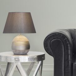 Illuminating Masterpieces: How Designer Table Lamps Elevate the Living Room