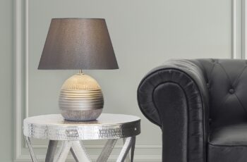 Illuminating Masterpieces: How Designer Table Lamps Elevate the Living Room